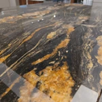 Branching Gold Leg Dining Table with Dark Gold-Veined Marble Top